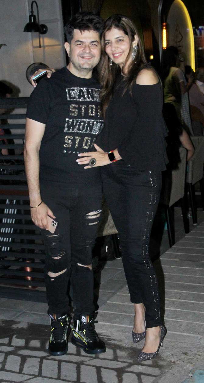 Dabboo Ratnani and wife Manisha looked happy to pose for the cameras at the restaurant launch event. The couple were twinning in all-black at the party.