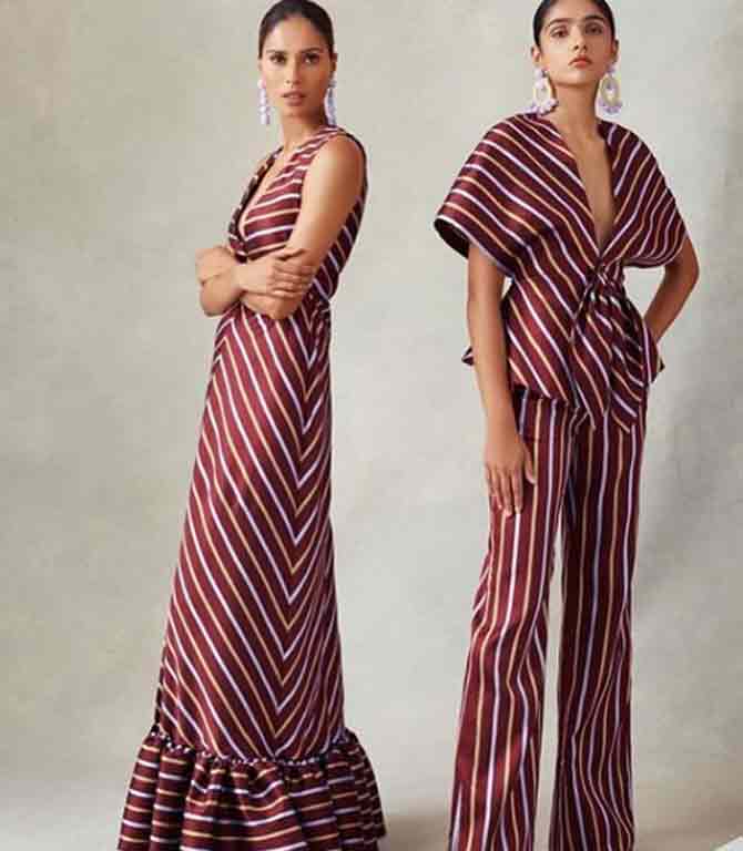 Apart from international brands, she had created quite a stir as a model in the Indian fashion industry. She has walked the ramp for the likes of Wendell Rodricks and Tarun Tahilliani. In this photo, she is wearing a crimson red maxi dress with her hair swept back and wearing hoop earrings.