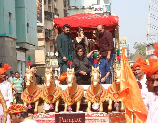 The makers of Panipat hosted a huge song launch event at a popular multiplex in Juhu, Mumbai. It was attended by Arjun Kapoor, Kriti Sanon, Ashutosh Gowariker, and music duo Ajay-Atul. All pictures/Yogen Shah