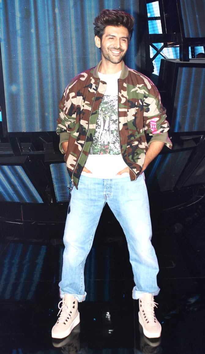The cast of Pati, Patni Aur Woh Kartik Aaryan, Bhumi Pednekar and Ananya Panday were spotted on the sets of Indian Idol for the promotional event of the movie. All pictures/Yogen Shah
In picture: Kartik Aaryan sported a camouflage jacket, paired with a graphic white tee and basic denim during the outing.