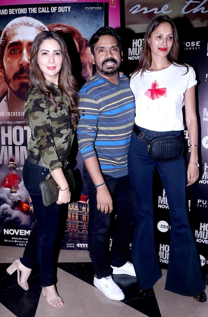 The producers of Hotel Mumbai hosted a special screening of the film on the event of the 11th anniversary of the ghastly attacks. From Chef Hemant Oberoi, the real-life hero and then head chef in 2008 of the Taj was present at the screening. All pictures/Yogen Shah
In picture: Kim Sharma with Mushtaq Sheikh and a guest at the special screening.