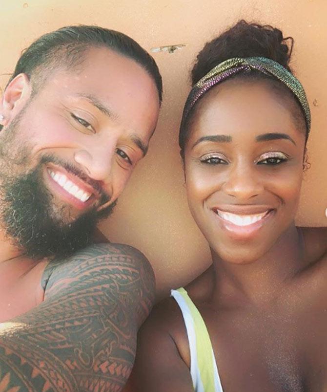 Naomi shared this cute photo with Jimmy Uso and had rapper Jay Z's lyrics from his song On The Run - “Deeper then words, beyond rightDie for your love, beyond lifeSweet as a Jesus piece, beyond iceBlind me baby with your neon lightsRay Bans on, police in sightOh, what a beautiful deathLet's both wear whiteIf you go to heaven and they bring me to hellJust sneak out and meet me, bring a box of L'sShe fell in love with the bad guy, the bad guyWhat you doing with them rap guys, them rap guysThey ain't see potential in me girl, but you see itIf it's me and you against the world, then so be it uh” Part ll Jay-Z @jonathanfatu