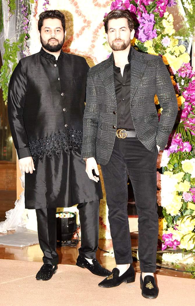 Neil Nitin Mukesh came in with brother Naman Nitin Mukesh at Devaansh Barjatya's wedding reception held in Mumbai. Neil has worked with Sooraj Barjatya in his film Prem Ratan Dhan Paayo.