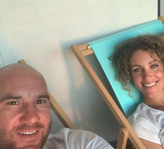 John Hastings and wife love to party at exotic beaches and locales