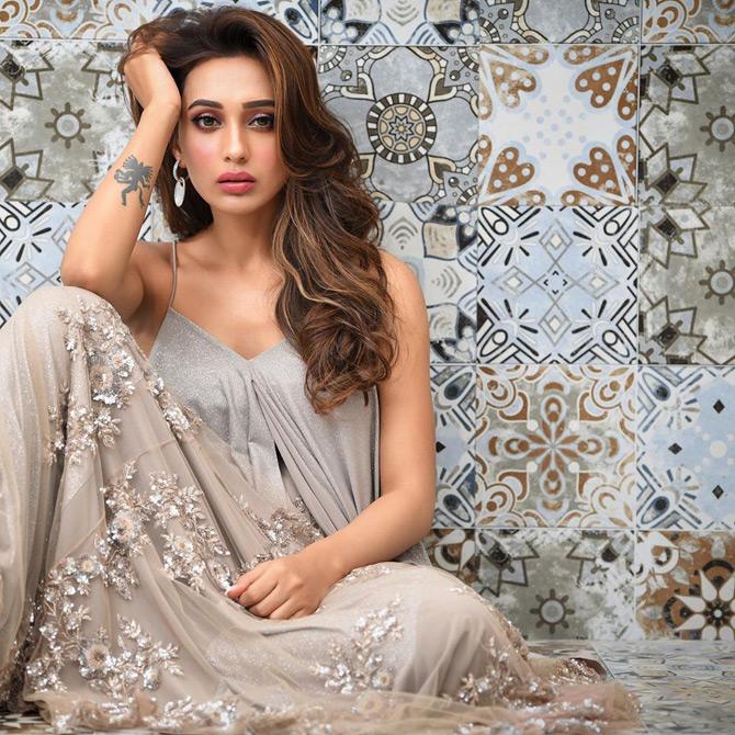 Bengali actress and MP Mimi Chakraborty has been making waves with her chic, glam and fabulous fashion choices. The 30-year-old actor-turned-politician from West Bengal has been setting the internet on fire with her stunning pictures and Mimi has a huge liking for all things grey.
In picture: Mimi Chakraborty looks elegant as she stuns in a grey embroidered dress.
