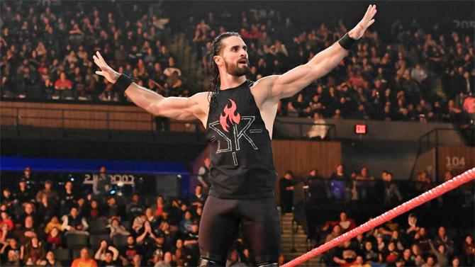 Seth Rollins arrives for his match against NXT champion Adam Cole in the WWE Raw main event