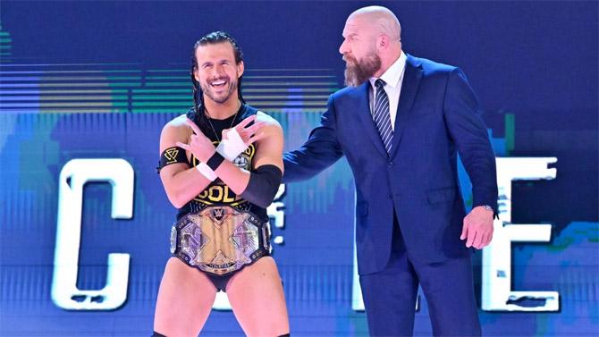 NXT champion Adam Cole, with Triple H alongside him, was geared up to face Rollins after he defeated