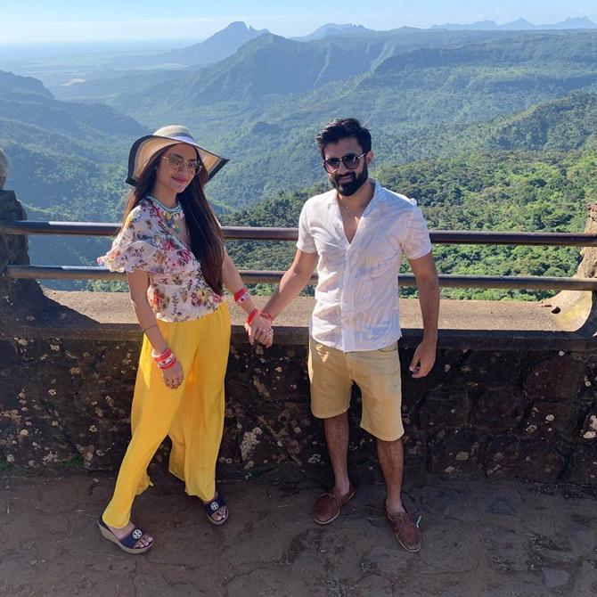 In picture: Nusrat Jahan and husband Nikhil Jain pose for the paparazzi at a scenic location