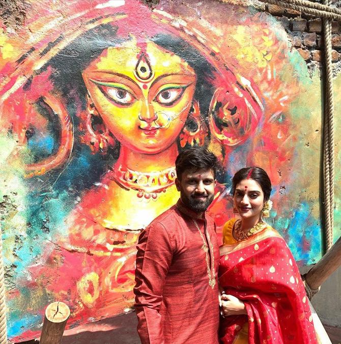 In photo: Nusrat Jahan and hubby Nikhil Jain pose for a picture after the two offered prayers at Suruchi Sangha Pandal in Kolkata during Durga Puja.