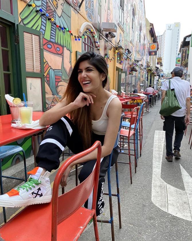 Ananya Birla who has always left an imprint with her fashion sense and choices donned an off-white tank top and teamed it with a pair of joggers in hues of black and white. Ananya completed her look with a pair of white sneakers.