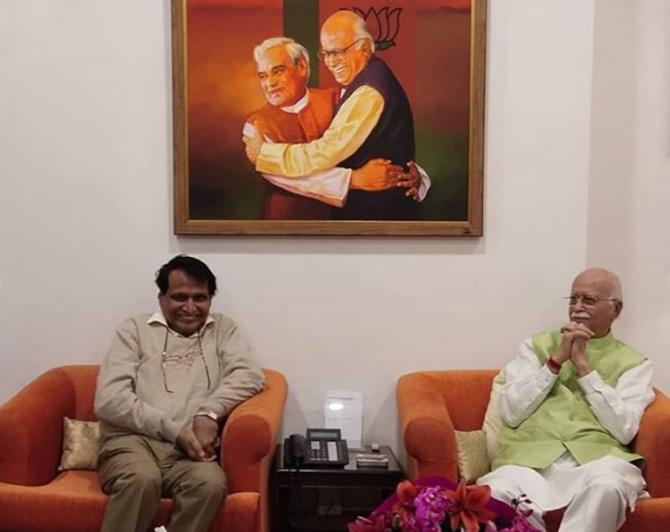 In picture: BJP leader Suresh Prabhu shares a candid conversation with Senior leader and party veteran LK Advani during the latter's 91st birthday at his residence in New Delhi in 2018. Picture/Instagram Suresh Prabhu