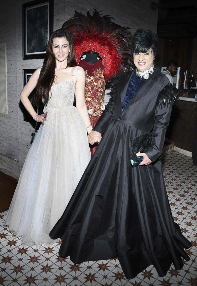 Giorgia Andriani, who is said to be dating Arbaaz Khan, looked no less than a princess in a white gown she opted for Rohit Verma's birthday celebration hosted in Juhu, Mumbai.