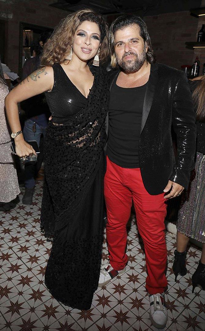 Popular designer Rohit Verma turned a year older on November 9, and the fashion designer hosted a huge birthday bash for his industry friend at a popular restaurant in Juhu, Mumbai. Tanaz Irani, who was seen wearing a black sheer saree, walked in with husband Bhaktiyaar Irani attended the celebration. All pictures/Yogen Shah