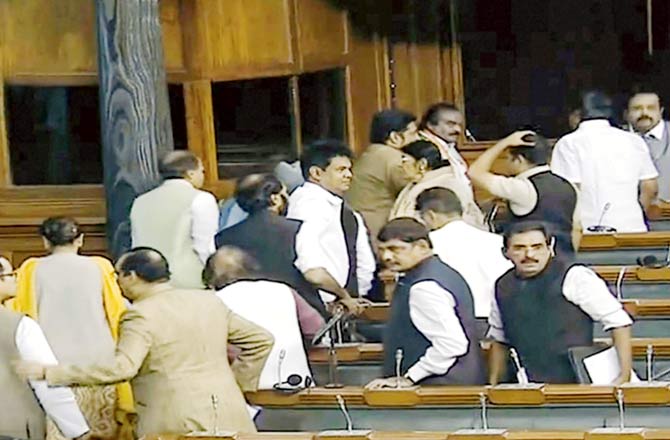 Congress MPs and their allies staged a walkout from the Lok Sabha over