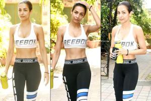 Malaika Arora looks fab in monochrome gym outfit; flaunts her abs