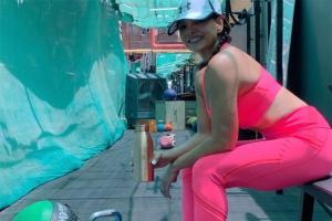 Deanne Panday's neon pink gym gear is a must-have; buy it here