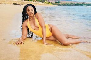 Tennis babe Sloane stuns in bikinis on beach during vacation