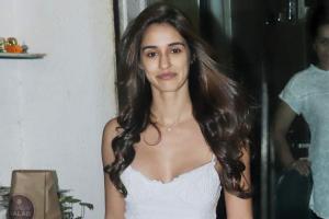Disha Patani steps out in a casual floral skirt and camisole; shop here