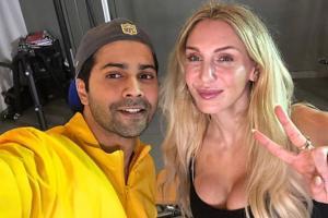 WWE Diva Charlotte Flair spends time with Varun Dhawan, stuns in saree