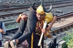 Trying to cross railway tracks? The God of death will you take you away