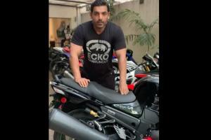 John Abraham shows off his bike collection; fan says 'ek bike dede'