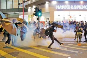 Arrest of three HK lawmakers heightens tension