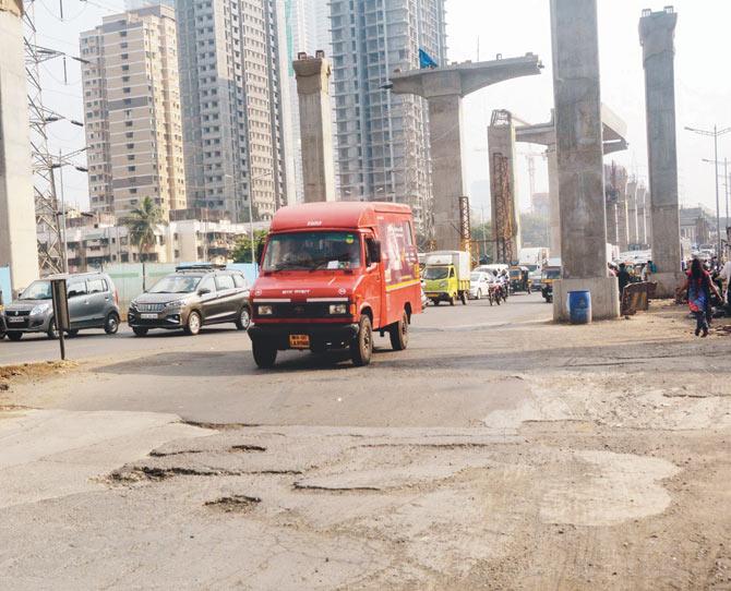 An uneven stretch of road seen on the WEH in Malad. PIC/SAYYED SAMEER ABEDI