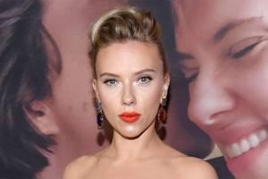 Scarlett Johansson shows off back tattoo