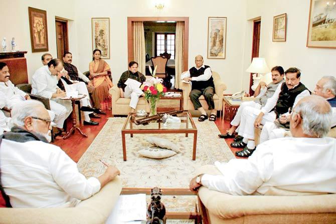 Nationalist Congress Party chief Sharad Pawar, senior Congress leader Ahmed Patel and others during the NCP-Congress meeting on government formation in Maharashtra, at Pawar’s residence in New Delhi. PIC/PTI