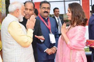 Yami Gautam greets PM Narendra Modi at the Rising Himachal event