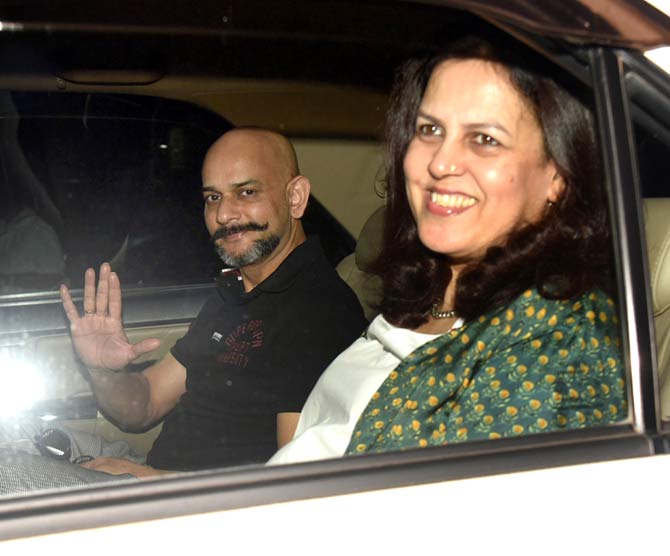 War which is directed by Siddharth Anand and produced by Yash Raj Films, the high-octane film will release in Hindi, Tamil and Telugu on October 2.
In picture: Vijay Krishna Acharya with wife arrive for the special screening of War in Andheri.
