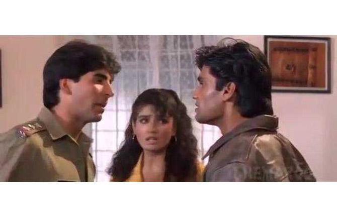 Mohra (1994): Akshay Kumar and Suniel Shetty fight it out like never before in this action, drama, thriller, directed by Rajiv Rai. The movie was declared blockbuster! The film also starred Raveena Tandon, Naseeruddin Shah, Gulshan Grover.