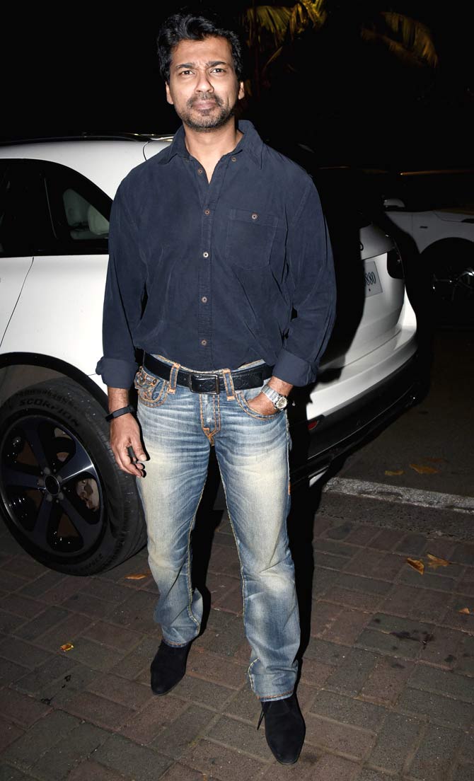 Actor and producer Nikhil Dwivedi poses for the photographers as he arrives for Dabangg 3 wrap up bash at Salman Khan's Galaxy Apartment in Bandra.