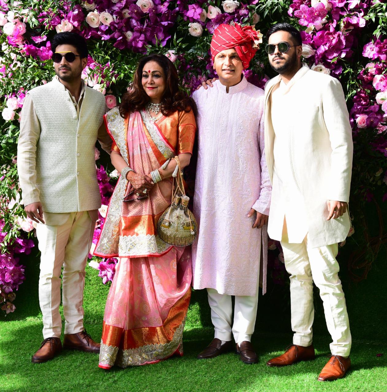 While Anmol and Anshul are the directors of the company, Anil Ambani will still remain the chairman and the promoter of the company.
In picture: Business tycoon Anil Ambani with his wife Tina Ambani and sons Jai Anmol and Jai Anshul at Akash Ambani and Shloka Mehta's wedding