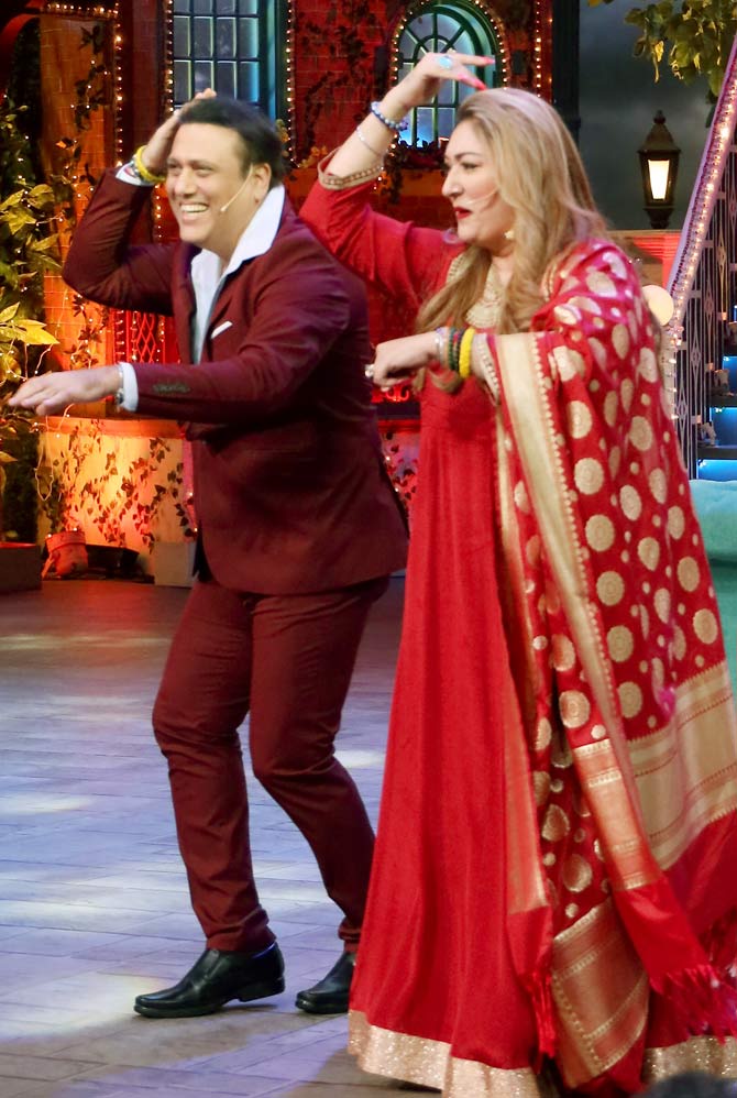 Speaking of Govinda's struggling years, the actor learnt acting from Roshan Taneja, took dance lesson from Saroj Khan and learnt action from Action master Ramji. All of them never took a penny from Govinda. However, eventually, he paid his part by serving them with whatever he can.
In picture: Govinda and Sunita Ahuja performed at the actor's superhit songs on the stage.