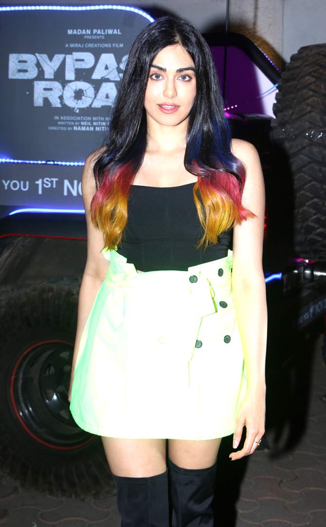 Bypass Road also stars Gul Panag, Shama Sikander, Rajit Kapoor, Sudhanshu Pandey, Manish Chaudhary and Taher Shabbir in pivotal roles.
In picture: Adah Sharma opted for a neon skirt, paired with blacktop and thigh-high boots for the event.