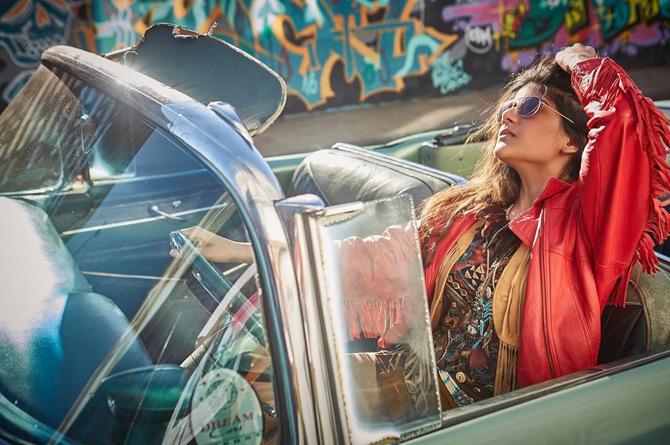 In picture: Ananya Birla shows off her driving skills in a convertible. Ananya writes: Dream