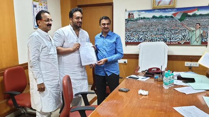 In picture: Zeeshan Siddique collects his AB form from MPCC, Tilak Bhavan. He took to Twitter to thank the Youth Wing of the Congress party for helping him create his own identity.