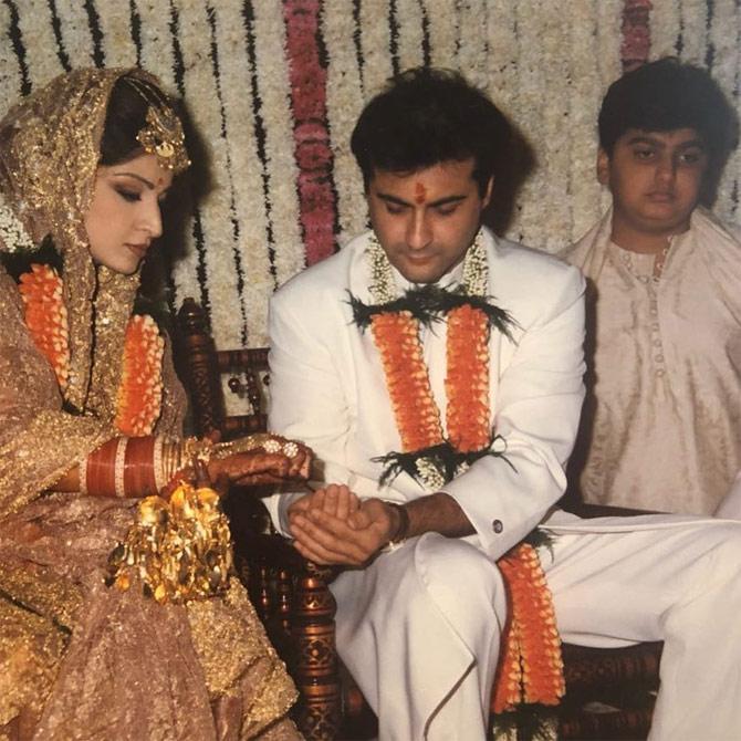 Sanjay Kapoor shared this photo from his wedding album, and the photo is hilarious for the obvious reason – the kid and his expressions. Well, that little one is none other than Arjun Kapoor, who clearly seems to be bored and tired standing behind his uncle. Sanjay Kapoor posted the photo with the caption, 