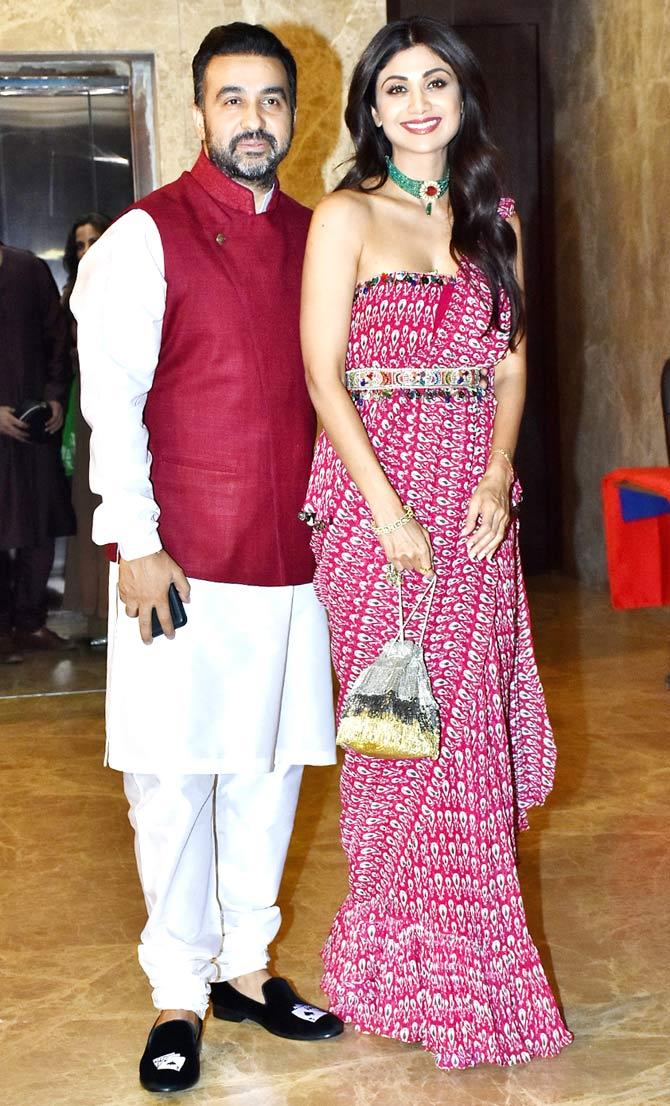 Shilpa Shetty Kundra and husband Raj Kundra were all smiles as they posed for the photographers at Ramesh Taurani's birthday bash in Bandra.