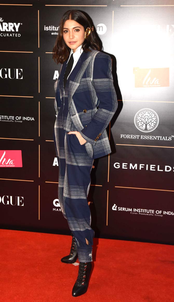 Anushka Sharma, who was last seen in Aanand L Rai's Zero, opted for a blue checkered suit to attend the award ceremony hosted in the city. She completed her cool look with an ear cuff and lace-up ankle-length boots.