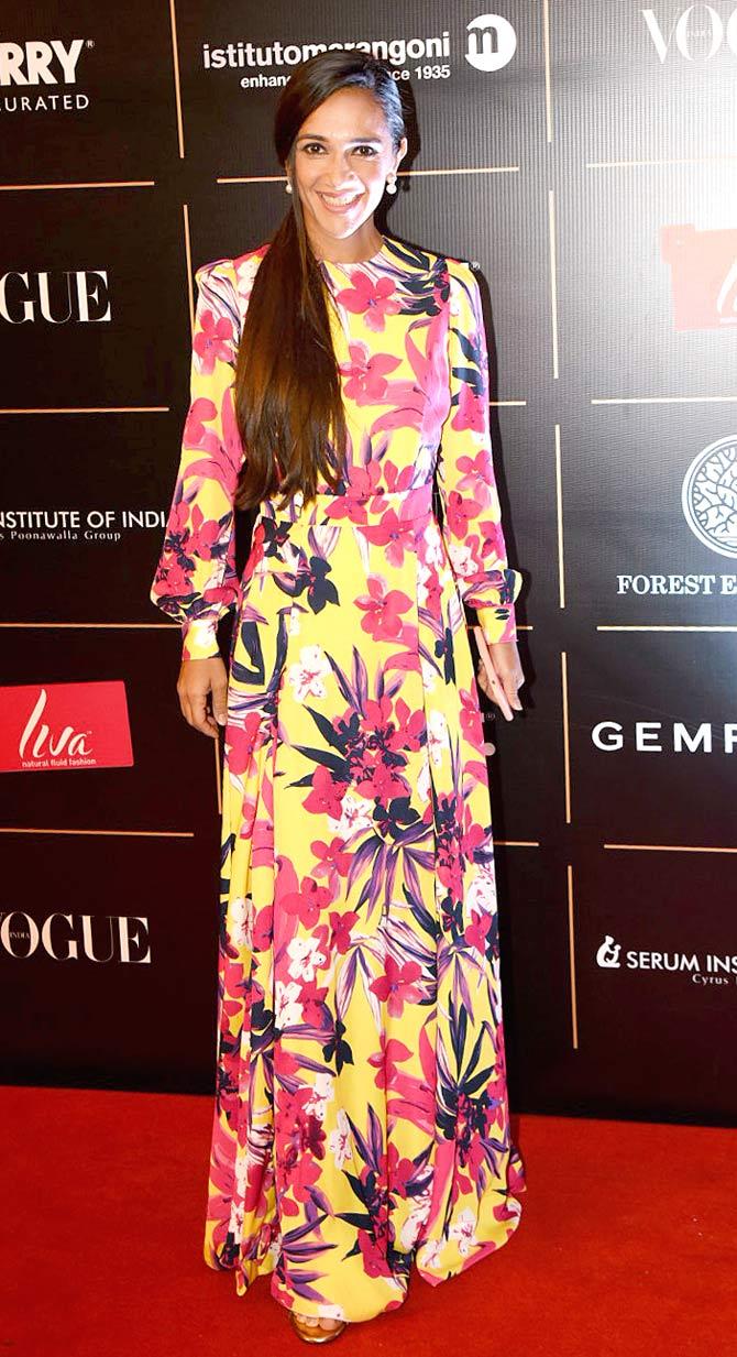 Tara Sharma opted for a tropical maxi dress to attend the awards ceremony hosted at a plush hotel in Mumbai.