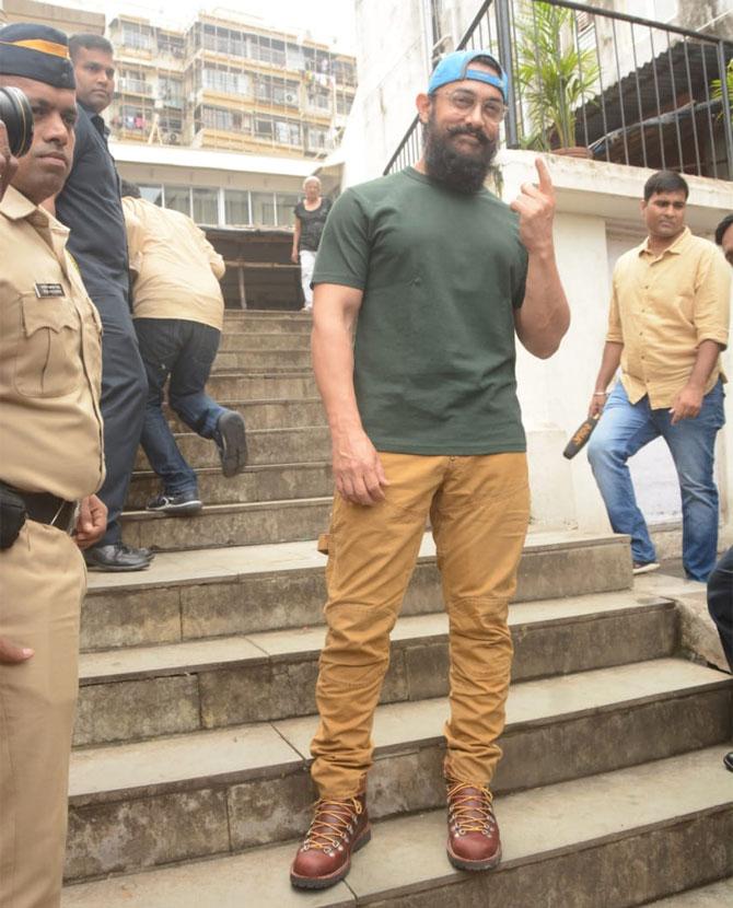 Bollywood actor Aamir Khan caught on camera after casting his vote at St Anne's High School in Bandra