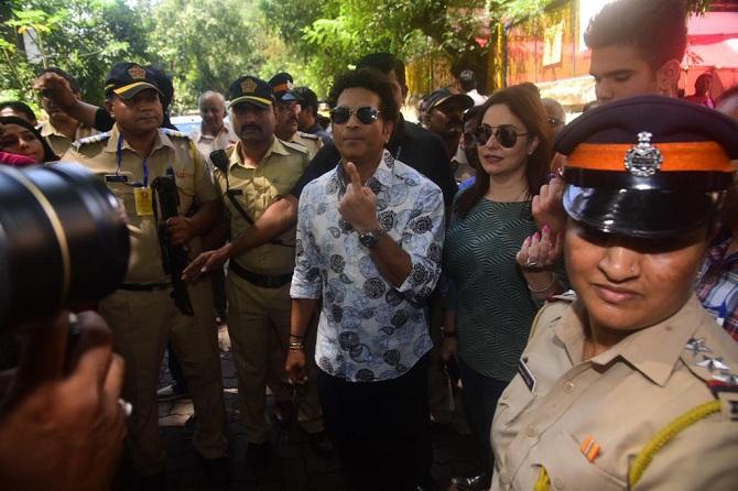 Sachin Tendulkar with his wife Anjali and his son Arjun cast their vote in Bandra. Pic/Atul Kamble