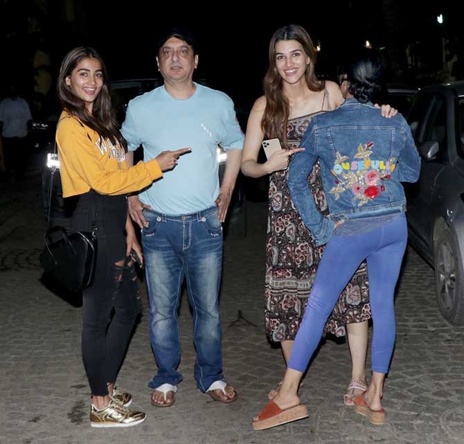 Sajid Nadiadwala and wife Wardha hosted a dinner outing for Kriti Sanon, Pooja Hegde and Kriti Kharbanda. The three actresses will star in Nadiadwala's next Housefull 4. All pictures/Yogen Shah
