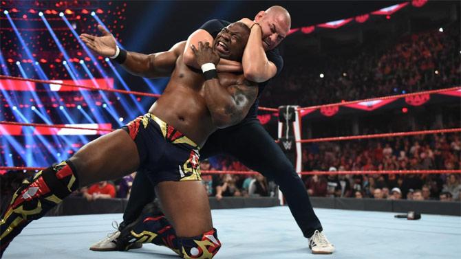 Former UFC champion Cain Velasquez came to the rescue of his friend Rey Mysterio after Shelton Benjamin began picking on the latter. Cain Velasquez took down Benjamin with his MMA moves. Cain will face UF rival Brock Lesnar for the WWE championship at Crown Jewel