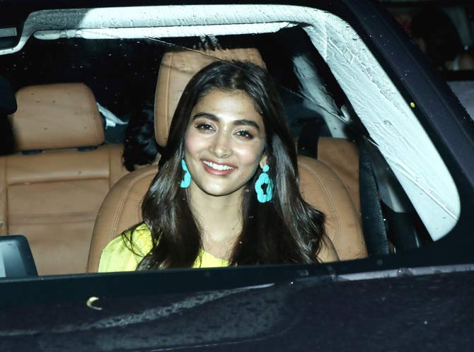But this isn't the end of the road for Kumar, Samji, Nadiadwala and Sanon. They all are reuniting for another entertainer titled Bachchan Pandey, which is all set to release on Christmas 2020.
In picture: Pooja Hegde was all smiles when snapped at the special screening.