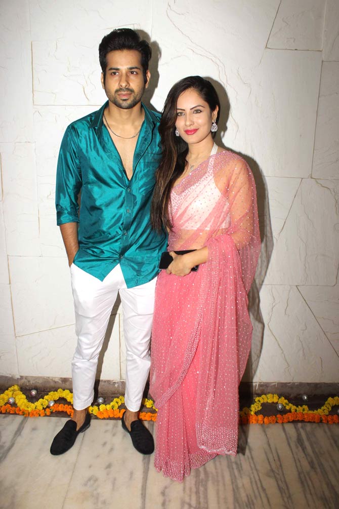 Puja Banerjee opted for a traditional red saree with a white blouse at the bash. She attended the party with her husband Kunal Verma.