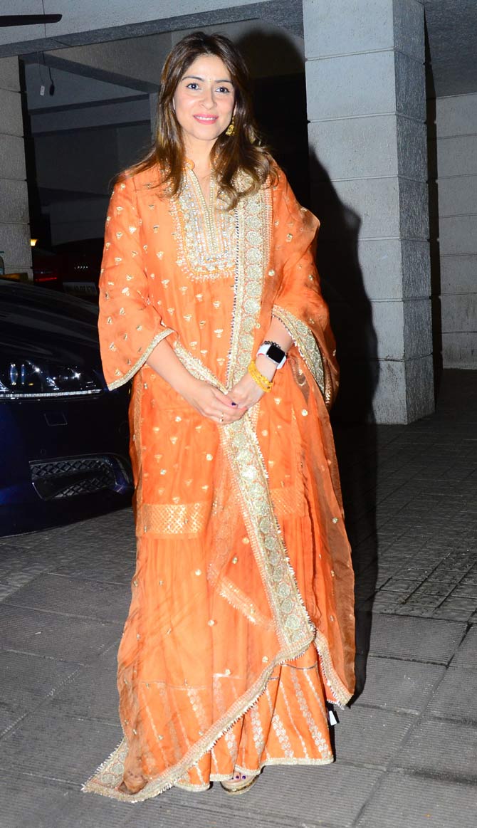 Bhavana Pandey looked festive in her bright orange sharara set when clicked at Pradeep Guha's party.