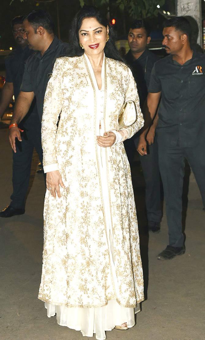 Simi Garewal was all smiles as she arrived at Amitabh Bachchan's Diwali party in her white ensemble.